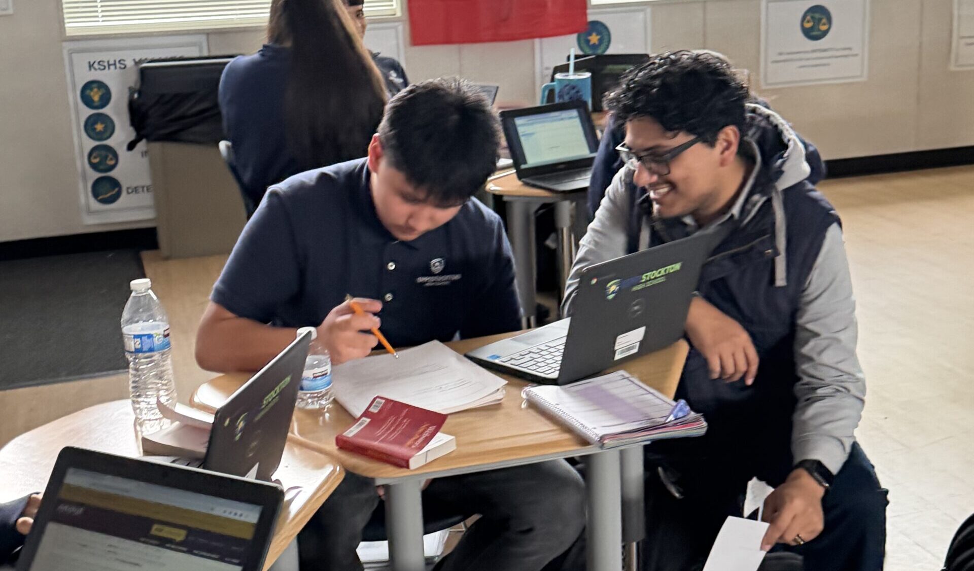 Emmanuel working with his grade 9 student!